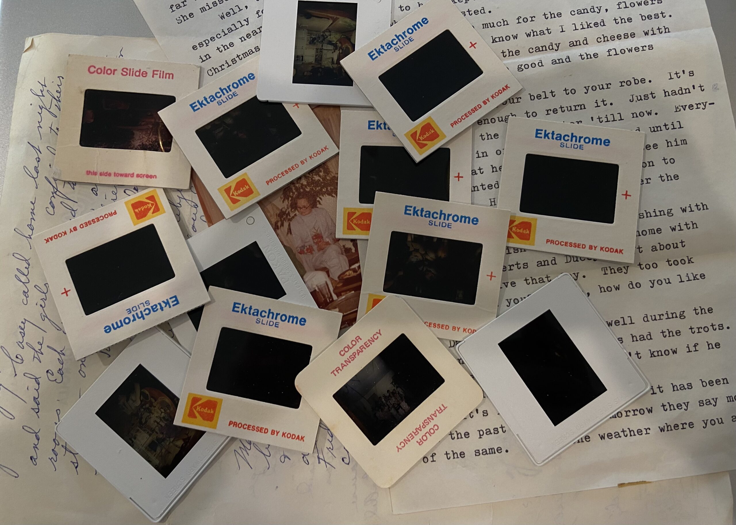 Letters and photo slides with a picture of my mom in the center