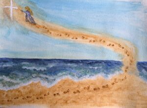 girl walking up a sandy path to the cross